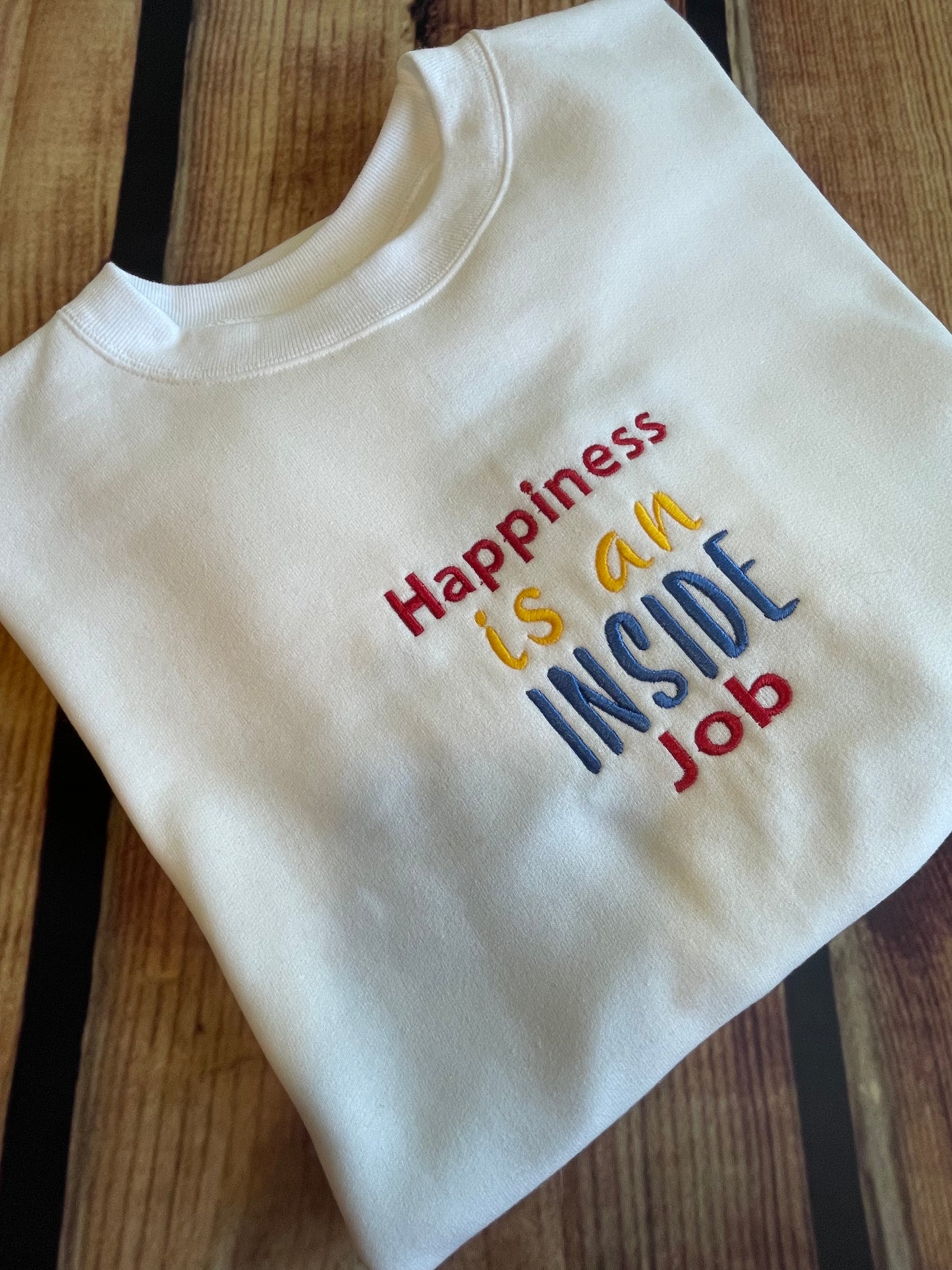 Womens Embroidered Happiness is an INSIDE job motivational sweatshirt